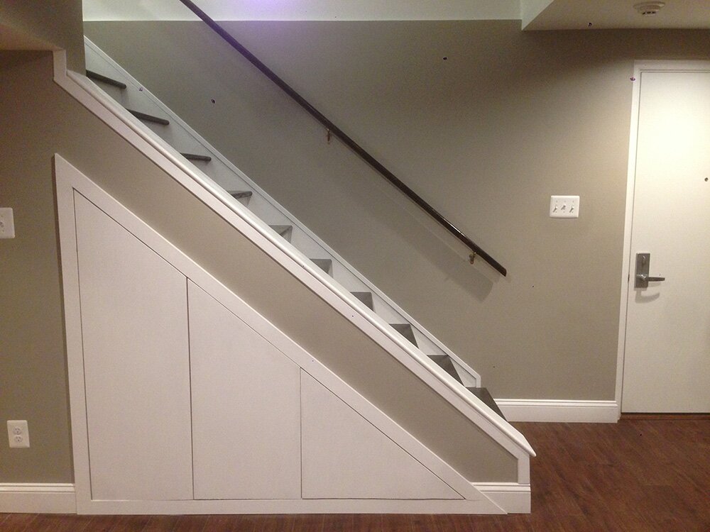 Surdus Basement Remodeling Stair Storage